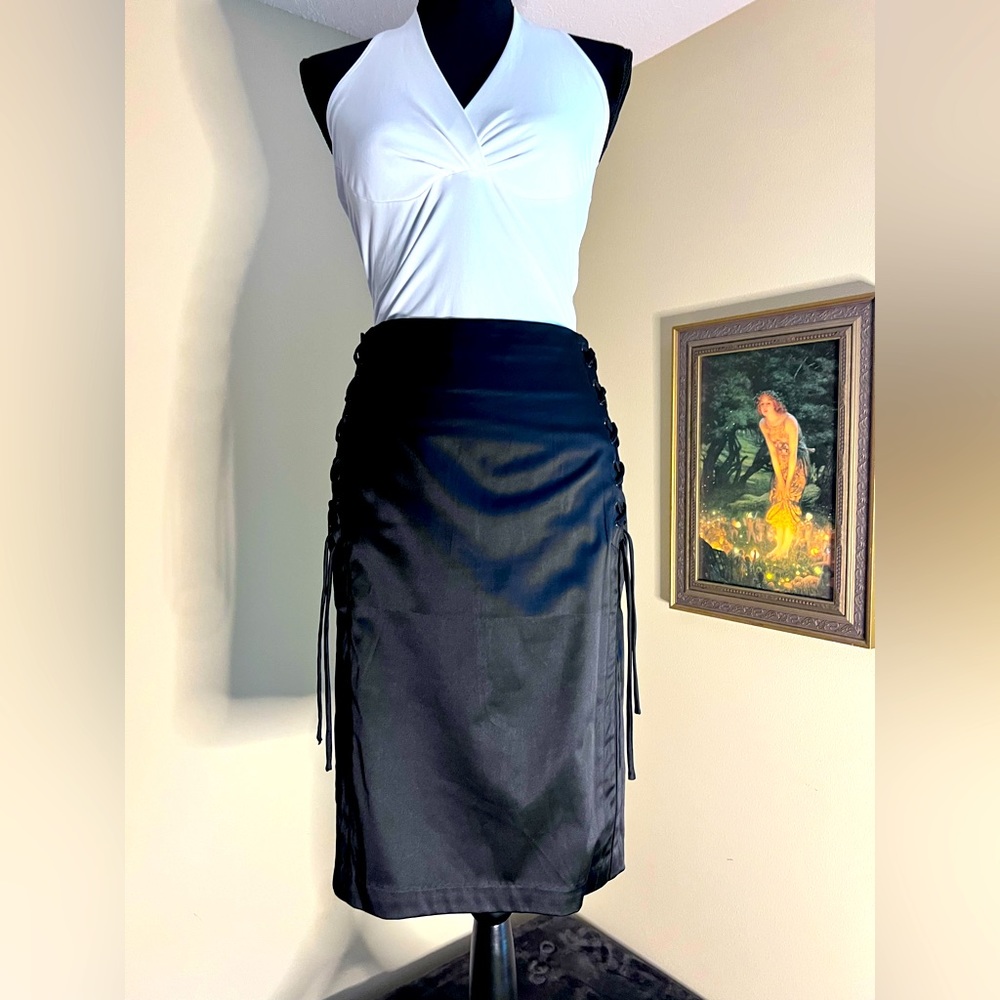 Women’s Charlotte Russe silky black below knee pencil skirt. NWOT. Size 7.